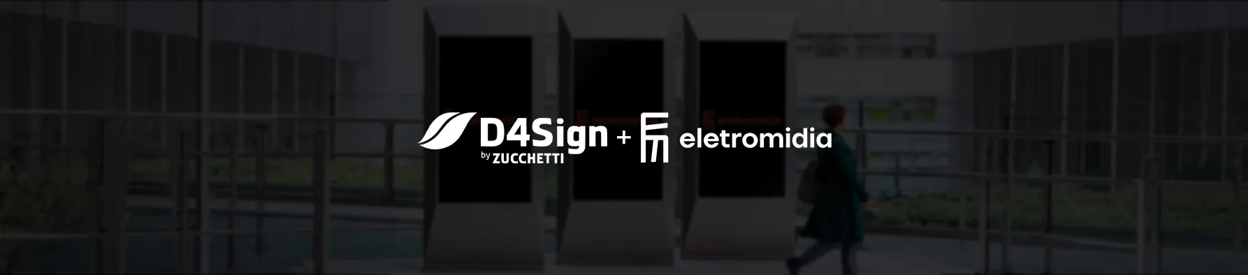 Logotipos da D4Sign e Eletromidia com painéis digitais ao fundo, ilustrando a assinatura eletrônica para mídia OOH.